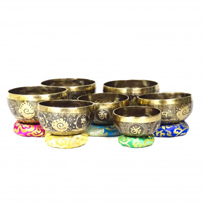 Small set of seven carved singing bowls of 4th octave from 262 hertz to 494 hertz via 440 hertz