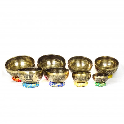 Hand hammered carved singing bowls carved with bouddhist symbols