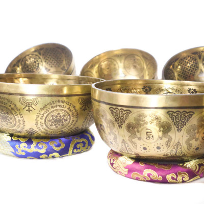 Super fine carved singing bowls