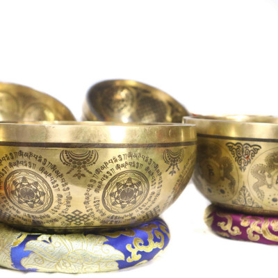 Super fine carved singing bowls