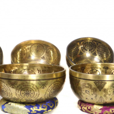 Super fine carved singing bowls
